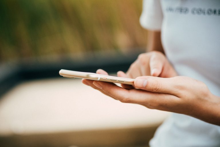 Photo of a woman using a cell phone to call someone. Do you struggle with depression? Learn how depression counseling in Coconut Creek, FL can help provide you with support.